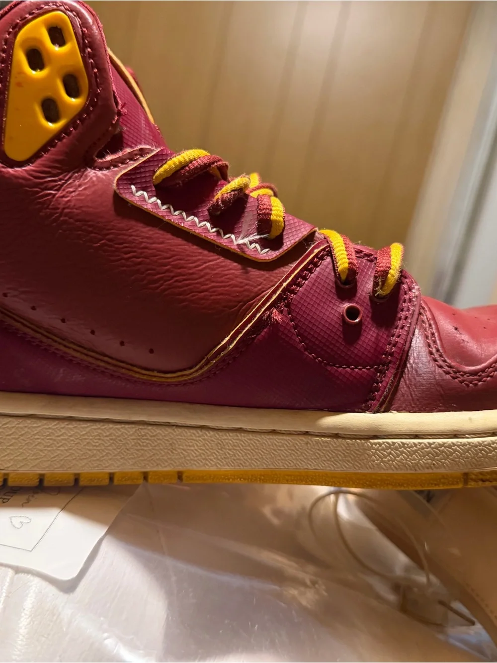 Burgundy and Yellow Air Jordan High-Top Sneakers